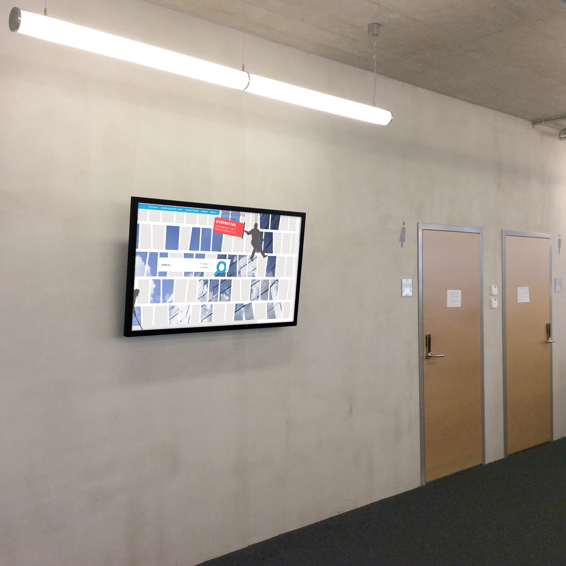 Digital Signage in der Universitätsbibliothek Freiburg.